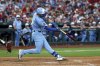 Kansas City Royals' Nick Loftin hits a solo home run during the fifth inning of a baseball game against the St. Louis Cardinals, Tuesday, June 3, 2025, in St. Louis. (AP Photo/Scott Kane)