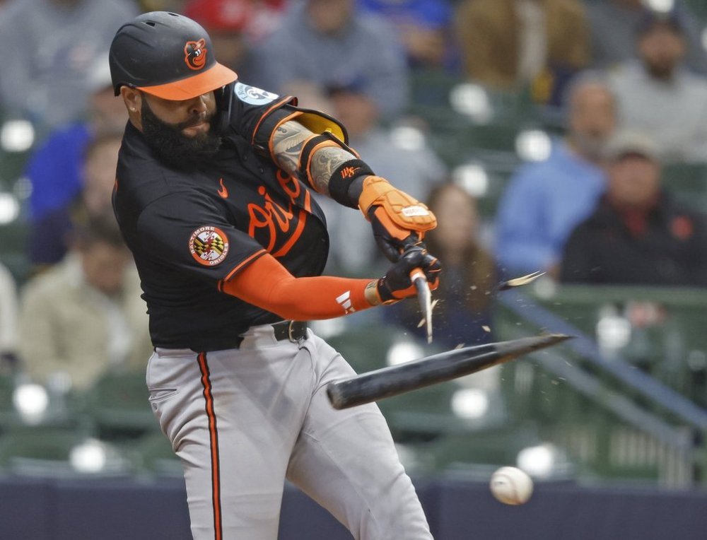 Baltimore Orioles' Emmanuel Rivera breaks his bat during the tenth inning of a baseball game against the Milwaukee Brewers, Wednesday, May 21, 2025, in Milwaukee. (AP Photo/Jeffrey Phelps)