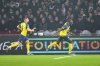 Union SG's Promise David, right, celebrates after scoring his side's second goal during the Europa League playoff soccer match between Ajax and Union Saint-Gilloise at the Johan Cruyff ArenA in Amsterdam, Netherlands, Thursday, Feb. 20, 2025. (AP Photo/Peter Dejong)