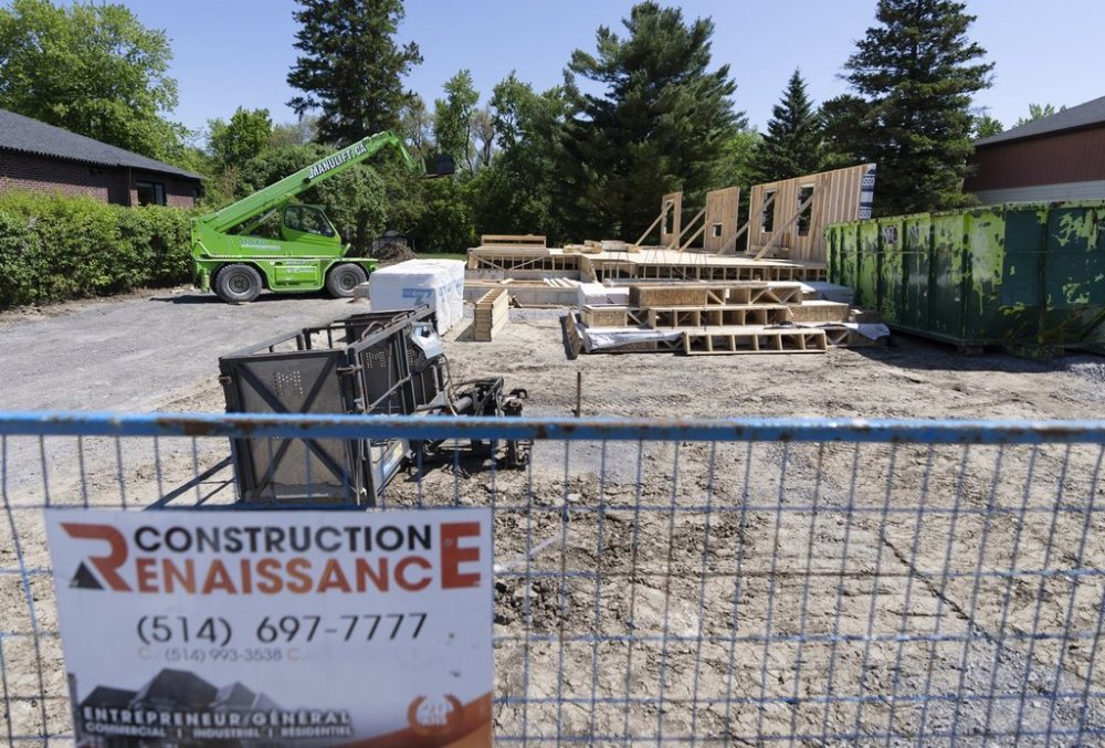 Work stoppage is seen on a residential construction site in the Montreal suburb of Pointe-Claire, Que., on May 28, 2025. THE CANADIAN PRESS/Christinne Muschi