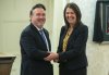 Dale Nally shakes hands with Alberta Premier Danielle Smith after Nally was sworn into cabinet as Minister of Service Alberta and Red Tape Reduction in Edmonton, Monday, Oct. 24, 2022. THE CANADIAN PRESS/Jason Franson