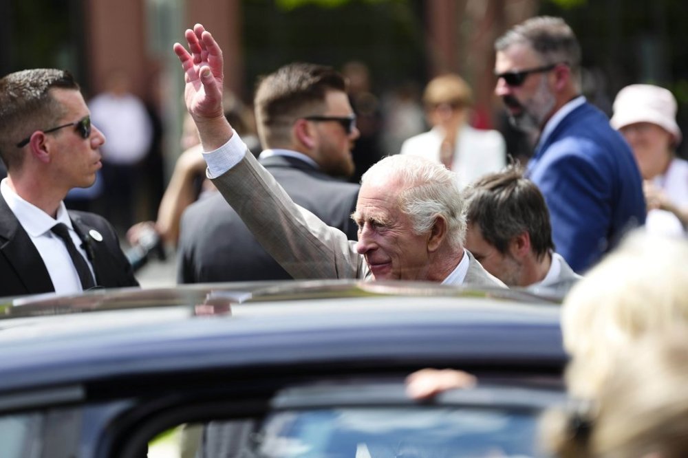 King Charles waves to the crowd as he departs a community gathering at Lansdowne Park in Ottawa during a royal visit on Monday, May 26, 2025. THE CANADIAN PRESS/Justin Tang