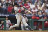 St. Louis Cardinals' Masyn Winn hits ahome run against Philadelphia Phillies pitcher Aaron Nola during the fourth inning in the second baseball game of a doubleheader Wednesday, May 14, 2025, in Philadelphia. (AP Photo/Matt Slocum)