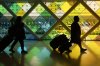 Travellers arrive at Miami International Airport, Thursday, June 5, 2025, in Miami, Fla. THE CANADIAN PRESS/AP, Marta Lavandier