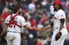 Cleveland Guardians relief pitcher Emmanuel Clase is congratulated by catcher Austin Hedges after the Guardians defeated the Los Angeles Dodgers in a baseball game, Wednesday, May 28, 2025, in Cleveland. (AP Photo/David Dermer)