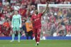 Liverpool's Mohamed Salah celebrates after scoring his side's first goal during the English Premier League soccer match between Liverpool and Crystal Palace at the Anfield stadium in Liverpool, England, Sunday, May 25, 2025. (AP Photo/Jon Super)