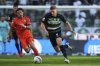 Sporting's Viktor Gyokeres, right, runs with the ball during the Portuguese league last round soccer match between Sporting CP and Vitoria SC at the Alvalade stadium in Lisbon, Saturday, May 17, 2025. (AP Photo/Ana Brigida)
