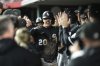 Chicago White Sox's Miguel Vargas, center, is congratulated in the dugout after hitting a three-run home run in the 10th inning of a baseball game against the Cincinnati Reds, Tuesday, May 13, 2025, in Cincinnati. (AP Photo/Kareem Elgazzar)