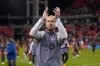 Toronto FC midfielder Michael Bradley (4) applauds to the crowd at the end of second-half MLS soccer action in Toronto on Saturday, Oct. 21, 2023. This was Bradley's final game of his MLS career. THE CANADIAN PRESS/Nathan Denette