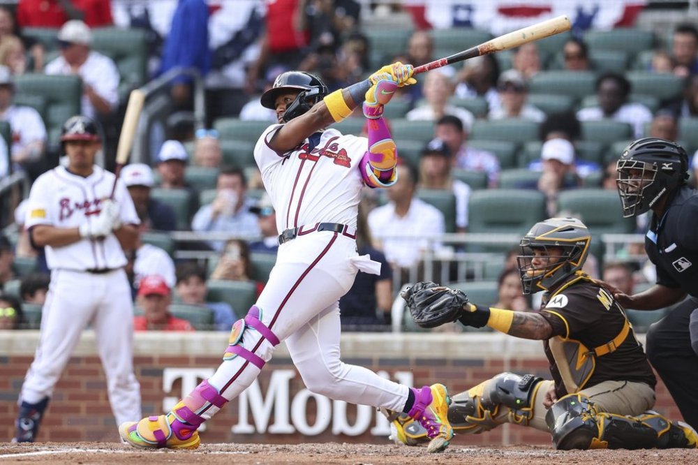 Atlanta Braves' Ronald Acuna Jr. hits a double in the fifth inning of a baseball game against the San Diego Padres, Sunday, May 25, 2025, in Atlanta. (AP Photo/Colin Hubbard)