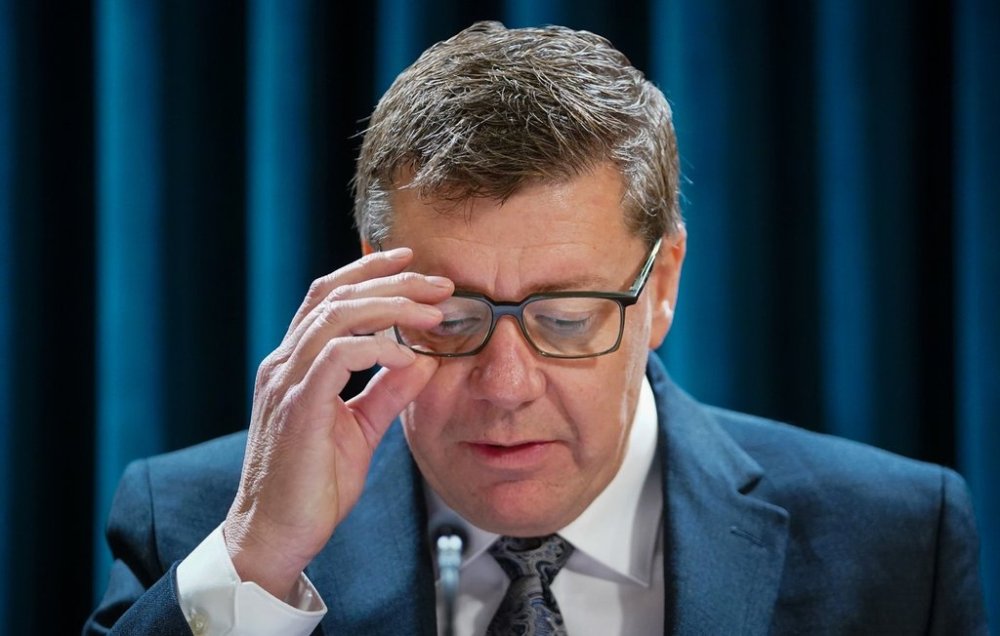 Saskatchewan Premier Scott Moe looks on during a press conference before Speech from the Throne in Regina, Monday, Nov. 25, 2024. Moe has declared a provincewide state of emergency in the fight against spreading out of control wildfires. THE CANADIAN PRESS/Heywood Yu