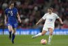 FILE -United States' Andi Sullivan, left, and England's Fran Kirby in action during the women's friendly soccer match between England and the US at Wembley stadium in London, Oct. 7, 2022. (AP Photo/Kirsty Wigglesworth, File)