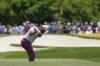 Jon Rahm, of Spain, hits from the fairway on the fifth hole during the third round of the PGA Championship golf tournament at the Quail Hollow Club, Saturday, May 17, 2025, in Charlotte, N.C. (AP Photo/Matt York)