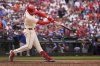 St. Louis Cardinals' Nolan Arenado hits a walk-off single to defeat the Los Angeles Dodgers in a baseball game Saturday, June 7, 2025, in St. Louis. (AP Photo/Jeff Roberson)