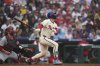 Philadelphia Phillies' Bryce Harper run-scoring-single off of St. Louis Cardinals pitcher Steven Matz during the seventh inning in the first baseball game of a doubleheader Wednesday, May 14, 2025, in Philadelphia. (AP Photo/Matt Slocum)