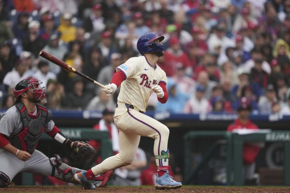 Philadelphia Phillies' Bryce Harper run-scoring-single off of St. Louis Cardinals pitcher Steven Matz during the seventh inning in the first baseball game of a doubleheader Wednesday, May 14, 2025, in Philadelphia. (AP Photo/Matt Slocum)