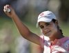 FILE - Lorena Ochoa, of Mexico, reacts after sinking the final putt to win the LPGA Samsung Challenge golf tournament at Bighorn Golf Club in Palm Desert, Calif., Oct. 15, 2006. (AP Photo/Reed Saxon, File)