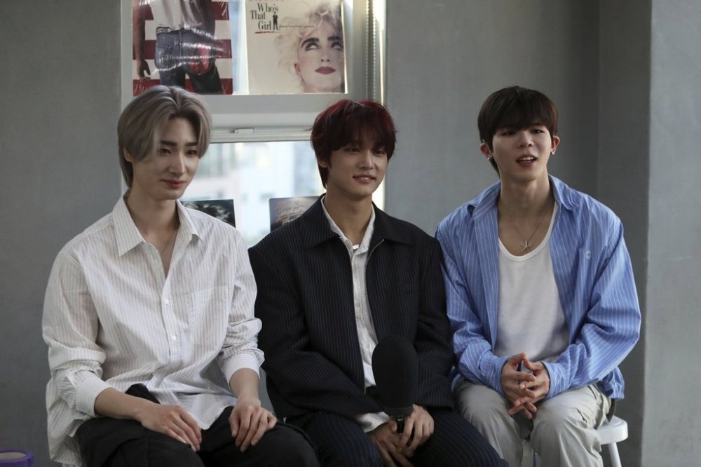 Members of K-pop band Big Ocean, Jiseok, PJ and Chanyeon, from left to right, participate in an interview with The Associated Press in Seoul, South Korea, April 15, 2025. (AP Photo/Juwon Park)