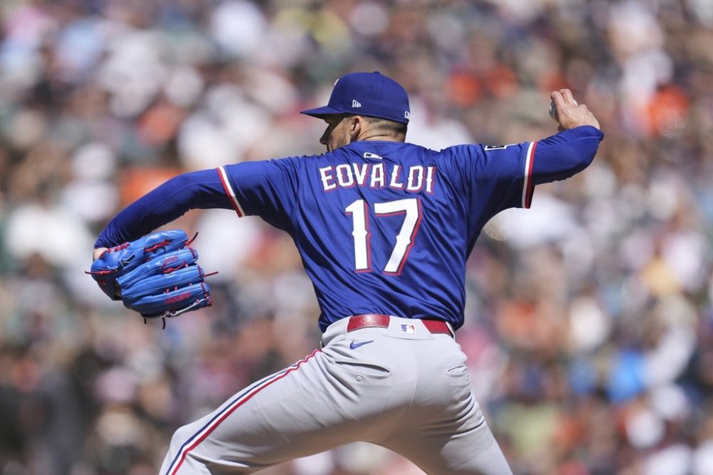 Texas Rangers pitcher Nathan Eovaldi throws against the Detroit Tigers in the seventh inning during a baseball game, Sunday, May 11, 2025, in Detroit. (AP Photo/Paul Sancya)