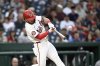 Washington Nationals' Dylan Crews hits a solo home run against Atlanta Braves pitcher Spencer Strider during the second inning of a baseball game in Washington, Tuesday, May 20, 2025. (AP Photo/Terrance Williams)