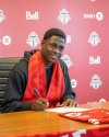 Jamaican youth international forward Jahmarie Nolan is shown in Toronto on Wednesday March 19, 2025, signing an MLS Next Pro contract with Toronto FC II. THE CANADIAN PRESS/HO-Toronto FC *MANDATORY CREDIT *