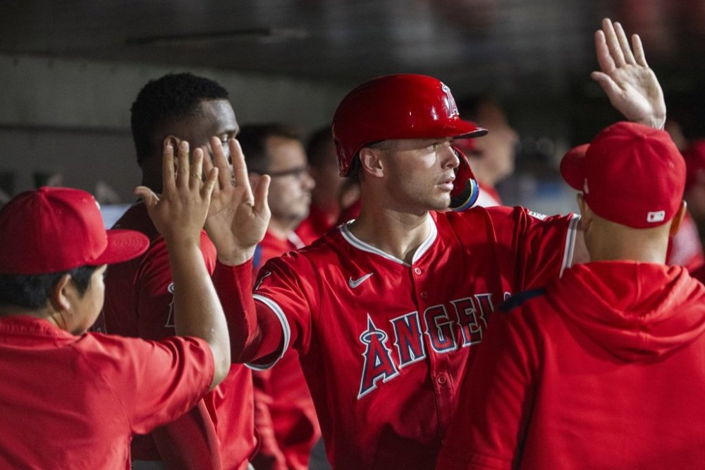 Los Angeles Angels' Logan O'Hoppe celebrates after scoring during the eighth inning of a baseball game against the Athletics in West Sacramento, Calif., Wednesday, May 21, 2025. (AP Photo/Nic Coury)