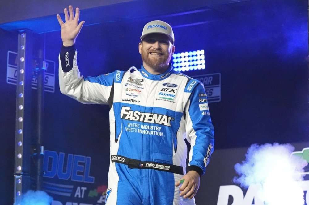 FILE - Chris Buescher during driver introductions before two NASCAR Daytona 500 qualifying auto races at Daytona International Speedway, Thursday, Feb. 13, 2025, in Daytona Beach, Fla. (AP Photo/John Raoux, File)