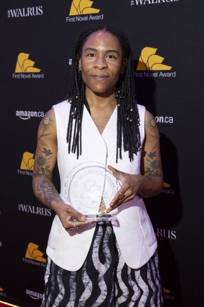 Author Valerie Bah poses with her Amazon Canada First Novel Award trophy, which she won for her debut novel 