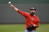 FILE - St. Louis Cardinals' Andrew Kittredge warms up before a baseball game against the Kansas City Royals, Aug. 10, 2024, in Kansas City, Mo. (AP Photo/Reed Hoffmann, file)