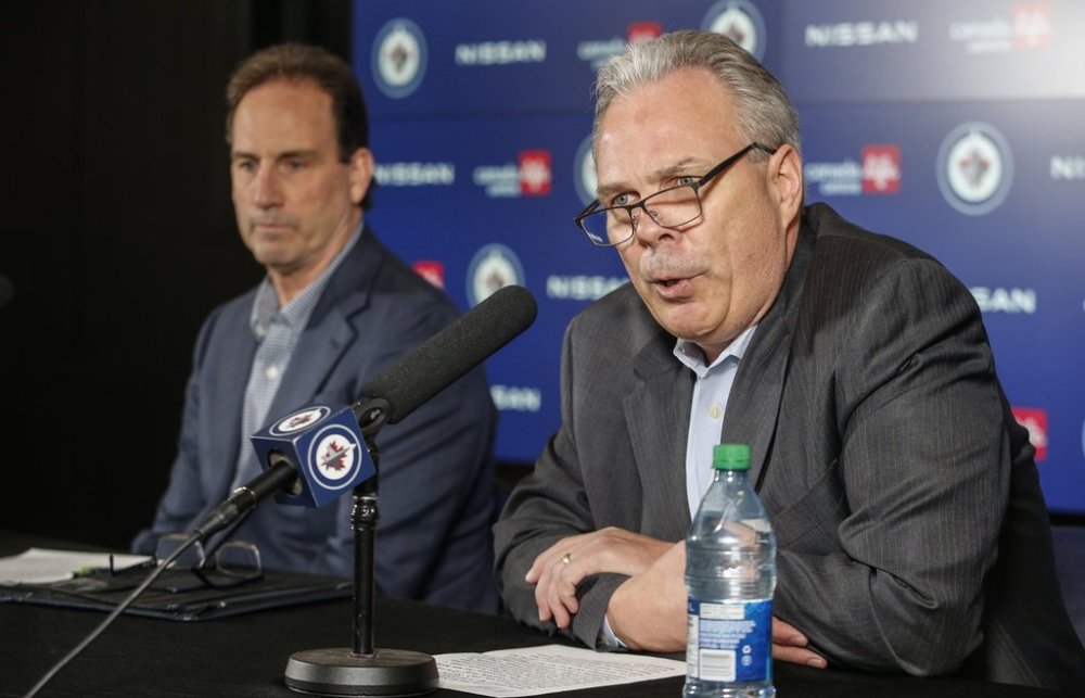 Winnipeg Jets General Manager Kevin Cheveldayoff, right, and head coach Scott Arniel speak to media at a press conference in Winnipeg, Monday, May 27, 2024. THE CANADIAN PRESS/John Woods