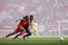 Freiburg's Jordy Makengo, front, and Frankfurt's Ansgar Knauff fight for the ball during the German Bundesliga soccer match between SC Freiburg and Eintracht Frankfurt at the Europa-Park Stadium in Freiburg im Breisgau, Germany, Saturday, May 17, 2025. (Philipp von Ditfurth/dpa via AP)
