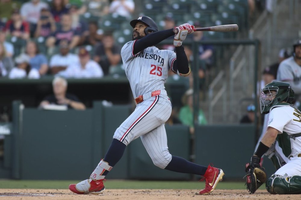 Minnesota Twins' Byron Buxton hits a double that scores two runs against the Athletics during the second inning of a baseball game Monday, June 2, 2025, in West Sacramento, Calif. (AP Photo/Scott Marshall)