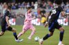 Inter Miami midfielder Lionel Messi, center, moves the ball during the first half of an MLS soccer match against the San Jose Earthquakes, Wednesday, May 14, 2025, in San Jose, Calif. (AP Photo/Godofredo A. Vásquez)
