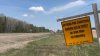 A burning ban warning sign is seen in the Rural Municipality of Lac du Bonnet, Man., on Thursday, May 15, 2025. Parts of Whiteshell Provincial Park that are a safe distance away from an out-of-control wildfire are set to reopen. THE CANADIAN PRESS/Steve Lambert