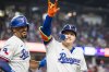 Texas Rangers' Joc Pederson celebrates a home run during the sixth inning of a baseball game against the Houston Astros, Saturday, May 17, 2025, in Arlington, Texas. (AP Photo/Jessica Tobias)