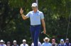 Ben Griffin reacts after a putt on the third hole during the final round of the Charles Schwab Challenge golf tournament at Colonial Country Club in Fort Worth, Texas, Sunday, May 25, 2025. (AP Photo/LM Otero)