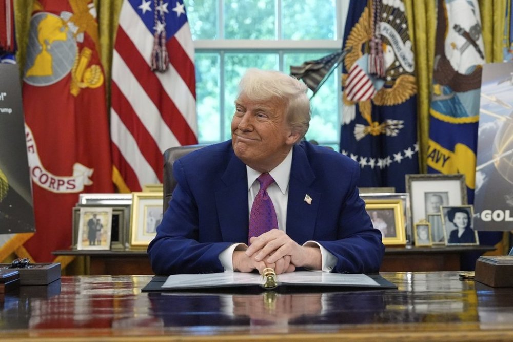 President Donald Trump smiles as he speaks in the Oval Office of the White House, Tuesday, May 20, 2025, in Washington. (AP Photo/Alex Brandon)