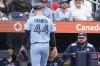 Blue Jays manager John Schneider watches pitcher Bowden Francis (44) walk back to the dugout after giving up six runs to the Philadelphia Phillies in the first inning of a Major League Baseball game in Toronto on Tuesday, June 3, 2025. THE CANADIAN PRESS/Chris Young
