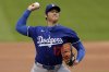 Los Angeles Dodgers' Shohei Ohtani (17), of Japan, throws live batting practice before a baseball game against the New York Mets on Sunday, May 25, 2025, in New York. (AP Photo/Adam Hunger)