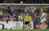 FILE - Barcelona's Lionel Messi, left, scores on a header during the UEFA Champions League final soccer match between Manchester United and Barcelona in Rome, May 27, 2009. (AP Photo/Gregorio Borgia, File)