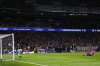 FILE - Atletico Madrid's Julian Alvarez falls to the ground after taking a penalty kick during a shootout at the end of the Champions League round of 16, second leg, soccer match between Atletico Madrid and Real Madrid at the Metropolitano stadium in Madrid, Spain, on March 12, 2025. (AP Photo/Manu Fernandez, File)