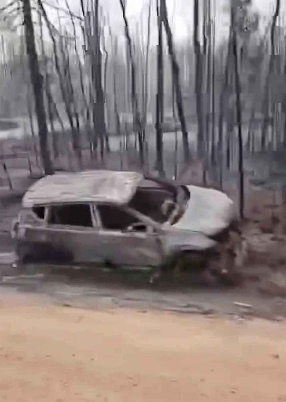 Image from video provided to the Free Press on scene from an affected resident in the RM of Lac du Bonnet shows a damaged vehicle beside the road. (Supplied)