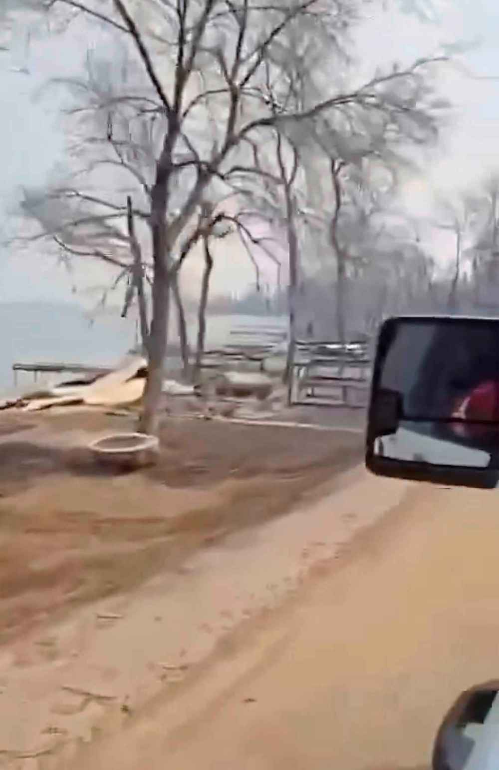 A crew surveying damage along Wendigo Road in the RM of Lac du Bonnet. (Supplied)