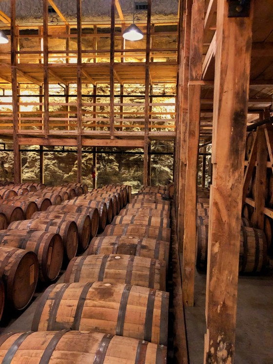 To qualify as bourbon (or at least bourbon-like), it must start with a mash of 51 per cent corn and be aged for two summers in new, charred-on-the-inside oak barrels, such as here at Maker's Mark. (Kelly Taylor / Free Press)