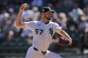 Chicago White Sox starting pitcher Adrian Houser (57) throws against the San Francisco Giants during the first inning of a baseball game Saturday, June 28, 2025, in Chicago. (AP Photo/Erin Hooley)