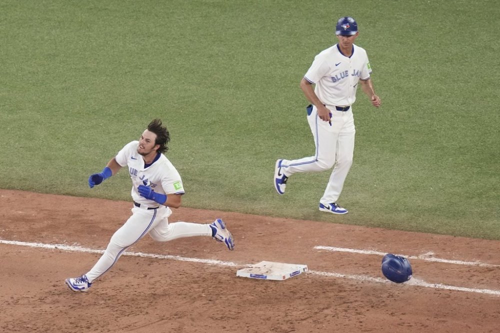 Toronto Blue Jays' Addison Barger (47) rounds the bases after hitting a walk off RBI single to defeat the Los Angeles Angels during eleventh inning MLB baseball action in Toronto on Saturday July 5, 2025. THE CANADIAN PRESS/Chris Young