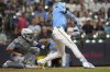 Milwaukee Brewers' Christian Yelich hits a two-run double during the eighth inning of a baseball game against the Colorado Rockies, Friday, June 27, 2025, in Milwaukee. (AP Photo/Aaron Gash)