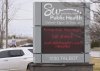 A sign outside Southwestern Public Health in St. Thomas, Ont. on Tuesday, March 4, 2025 warns residents to call ahead before visiting a doctor or hospital if they think they have the measles. THE CANADIAN PRESS/Geoff Robins