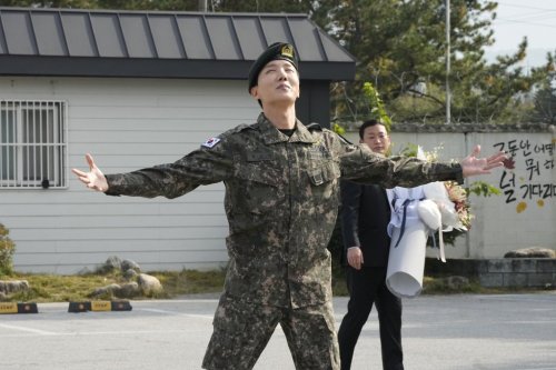 FILE - K-pop band BTS's member J-Hope reacts after being discharged from a mandatory military service outside of an army base in Wonju, South Korea, Thursday, Oct. 17, 2024. (AP Photo/Ahn Young-joon, File)