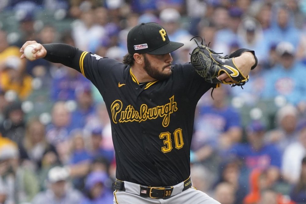 Pittsburgh Pirates pitcher Paul Skenes (30) throws during the first inning of a baseball game against the Chicago Cubs, Friday, June 13, 2025, in Chicago. (AP Photo/David Banks)
